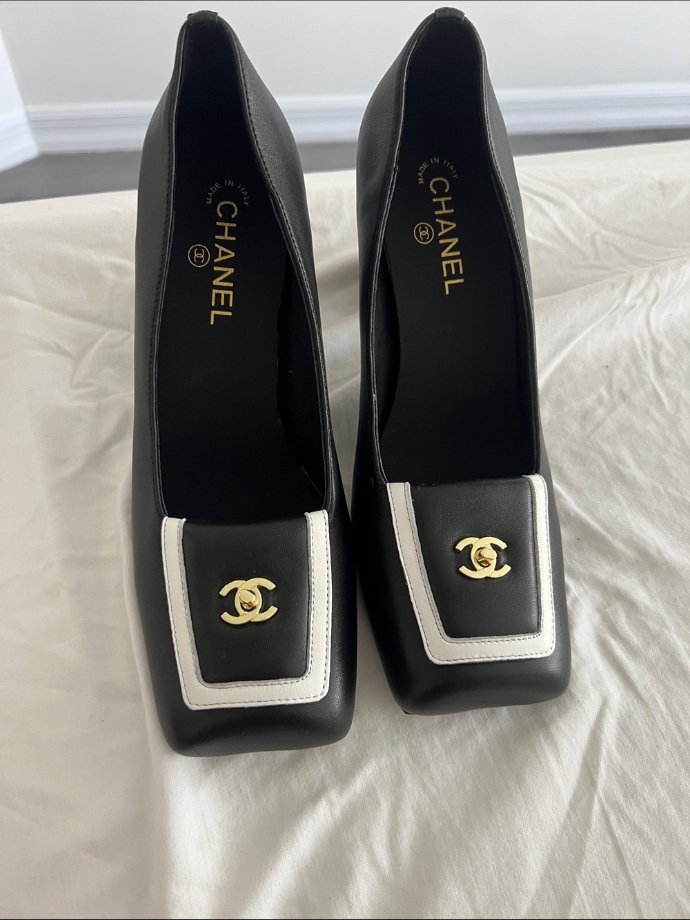CHANEL Black and White Leather Square-Toe Pumps with Gold CC